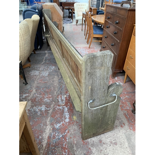 191 - A Victorian pitch pine church pew - approx. 101cm high x 308cm wide x 40cm deep