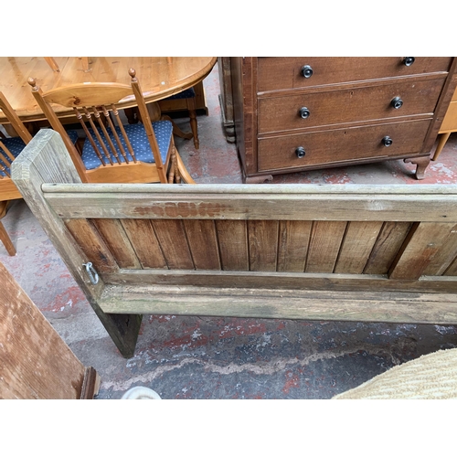 191 - A Victorian pitch pine church pew - approx. 101cm high x 308cm wide x 40cm deep