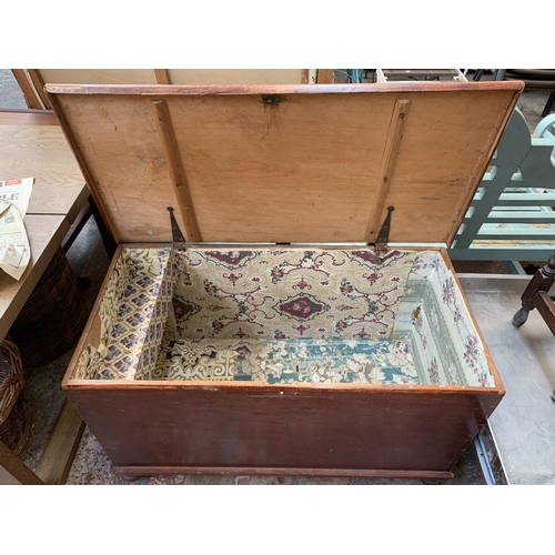 198 - A Victorian stained pine blanket box - approx. 60cm high x 102cm wide x 50cm deep