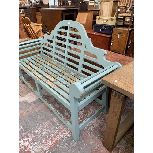 206 - A Lutyens style green painted teak three seater garden bench - approx. 105cm high x 164cm wide x 57c... 