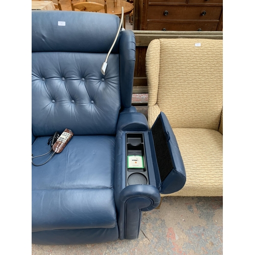 216 - A Willowbrook blue leather electric rise and recline armchair with remote control and reading light