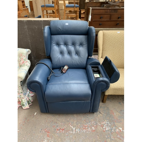 216 - A Willowbrook blue leather electric rise and recline armchair with remote control and reading light