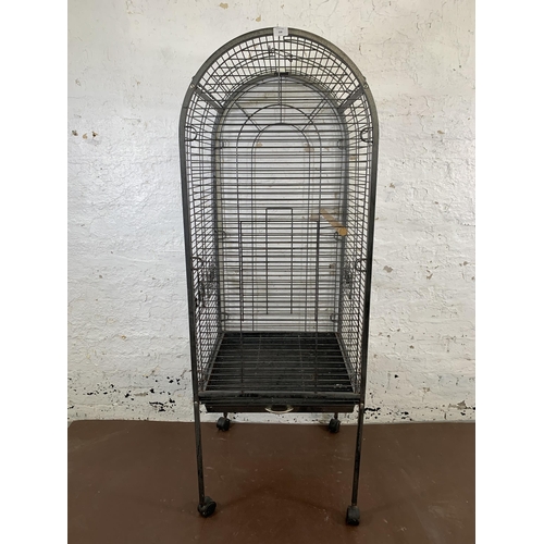 228 - A large grey metal bird cage on castors - approx. 157cm high x 56cm wide x 56cm deep