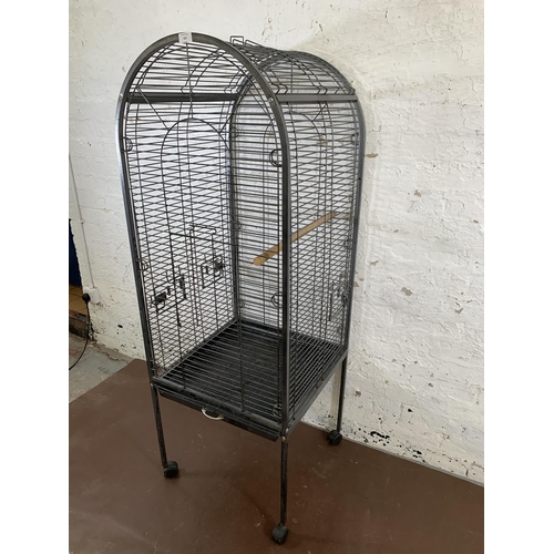 228 - A large grey metal bird cage on castors - approx. 157cm high x 56cm wide x 56cm deep