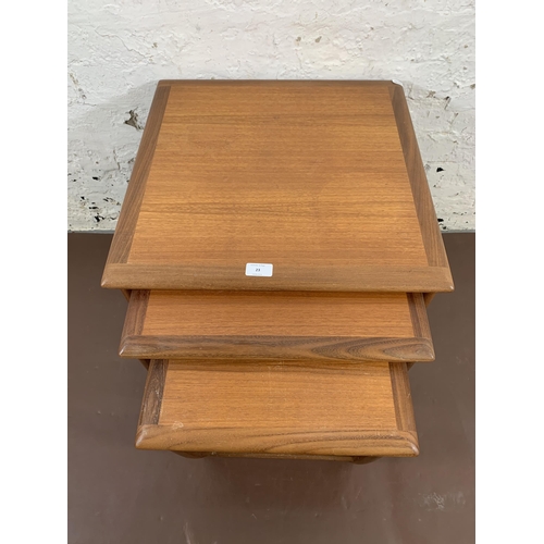 23 - A mid 20th century G Plan Astro teak nest of three tables - largest approx. 51cm high x 50cm wide x ... 