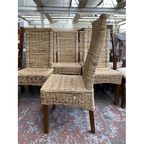 235 - Six wicker high back dining chairs