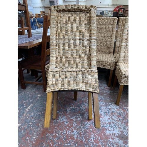 235 - Six wicker high back dining chairs