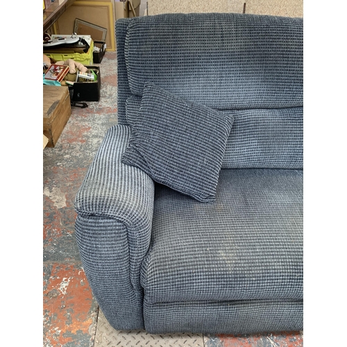 239 - A modern grey fabric upholstered three seater reclining sofa - approx. 100cm high x 205cm long x 78c... 