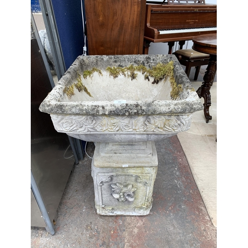 245 - A cast stone pedestal garden planter - approx. 80cm high