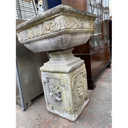 245 - A cast stone pedestal garden planter - approx. 80cm high