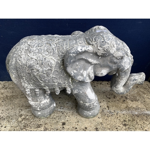 250 - A Thai style grey painted fibreglass elephant - approx. 37cm high x 67cm long