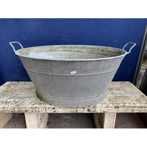 252 - A vintage galvanised twin handled bathtub - approx. 32cm high x 70cm wide x 56.5cm deep