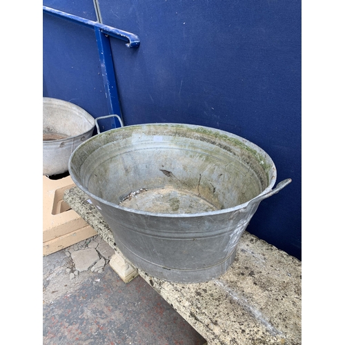 252 - A vintage galvanised twin handled bathtub - approx. 32cm high x 70cm wide x 56.5cm deep