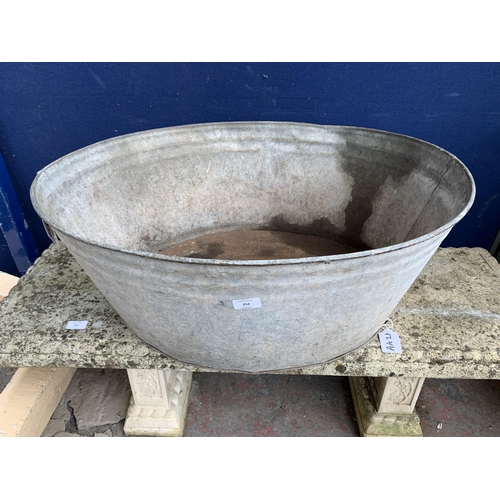 254 - A vintage galvanised bath tub