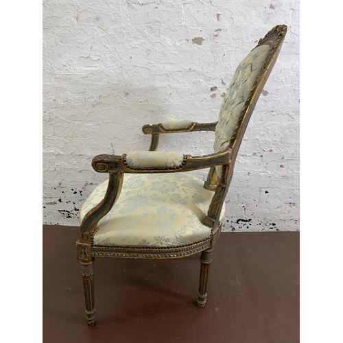 28 - A French Louis XVI style gilt wood and floral fabric upholstered open armchair - approx. 99cm high x... 
