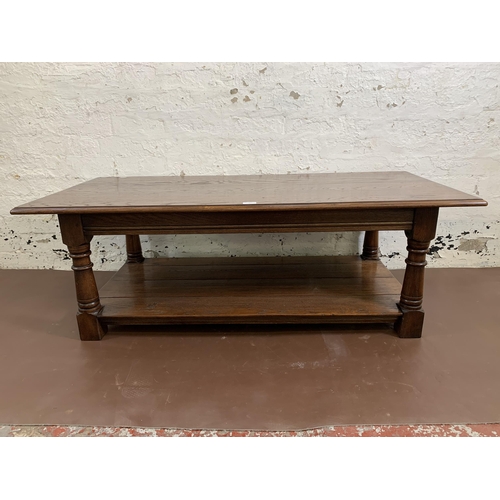 42 - A Titchmarsh & Goodwin style solid oak rectangular two tier coffee table on turned supports - approx... 