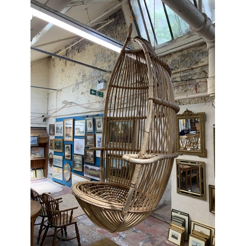 53 - A 1970s Boho style wicker and bamboo hanging egg chair