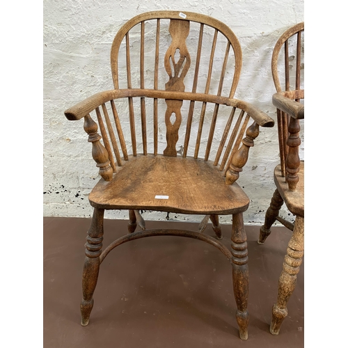 54 - A near pair of 19th century elm and beech Windsor armchairs