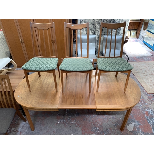 55 - A mid 20th century Scandinavian teak extending dining table and six chairs - approx. 73cm high x 100... 