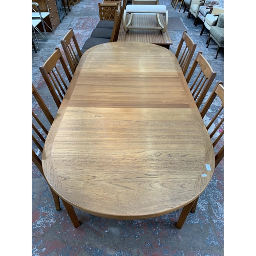 55 - A mid 20th century Scandinavian teak extending dining table and six chairs - approx. 73cm high x 100... 