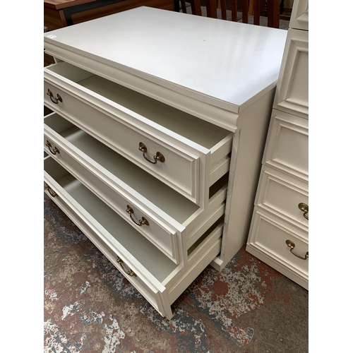 59 - A white laminate chest of drawers - approx. 65cm high x 81cm wide x 49cm deep