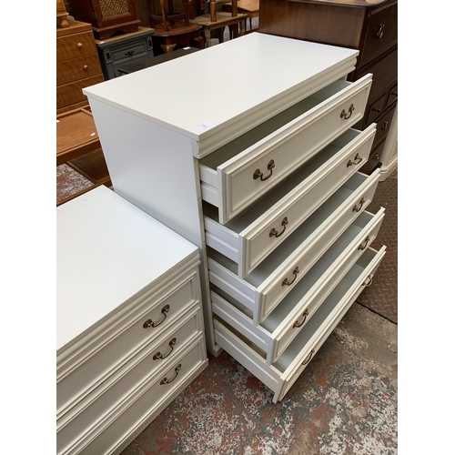 60 - A white laminate chest of drawers - approx. 98cm high x 81cm wide x 46cm deep