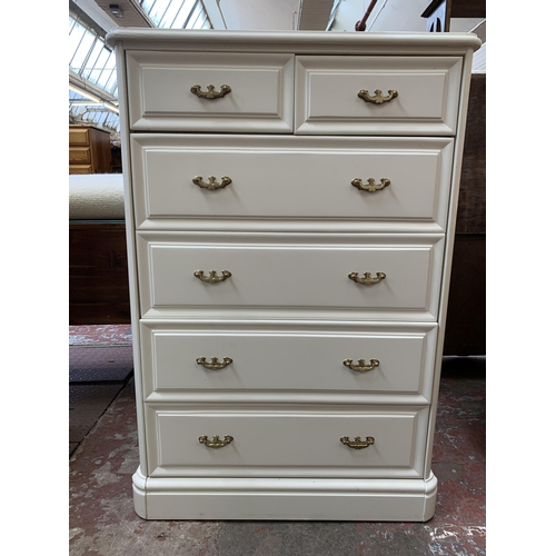 62 - An Olympus white painted chest of drawers