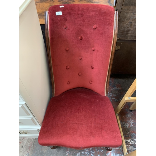 63 - A Victorian style beech and red fabric upholstered bedroom chair on brass and ceramic castors