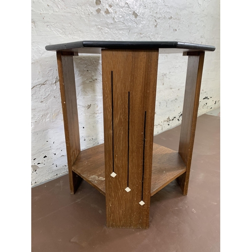 73 - An Art Deco inlaid mahogany octagonal two tier side table - approx. 58cm high x 53cm wide x 52cm dee... 