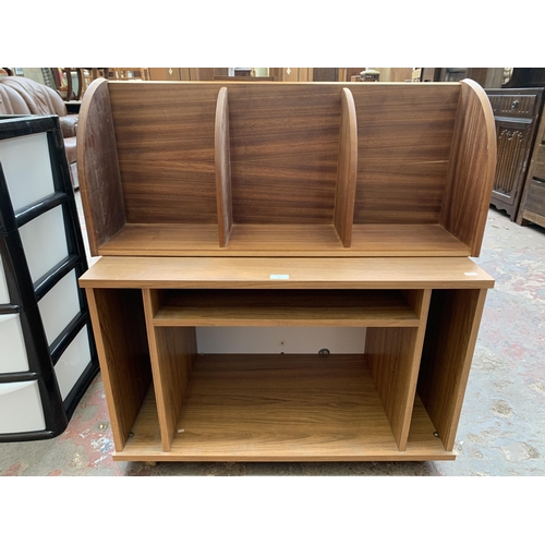 76 - Two pieces of mid/late 20th century furniture, one teak effect media unit on castors and one teak sh... 