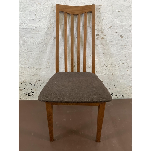 90 - Four mid 20th century style beech and fabric upholstered dining chairs