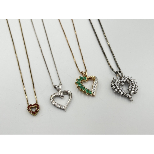 2290 - Four .925 silver heart shaped pendant necklaces to include garnet, CZ etc.