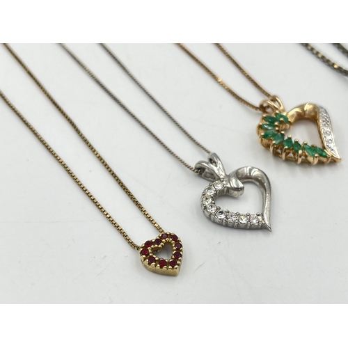 2290 - Four .925 silver heart shaped pendant necklaces to include garnet, CZ etc.