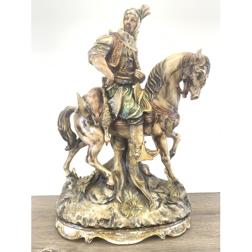 333 - An Italian Capodimonte style hand-painted porcelain figurine of an Arab on horseback - approx. 66cm ... 