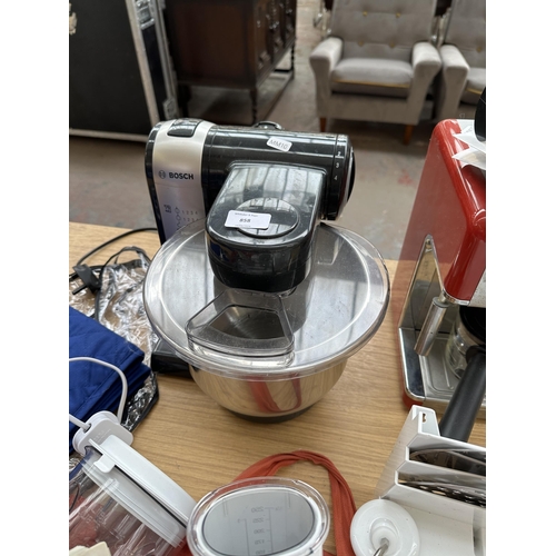 858 - Three items to include Bosch MUM46 food processor with attachments and instruction manual, Cooks Pro... 