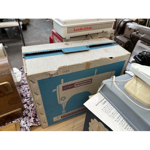 862 - Four boxed vintage boxed child's sewing machines, one Little Betty Debutant electric, one Singer cha... 