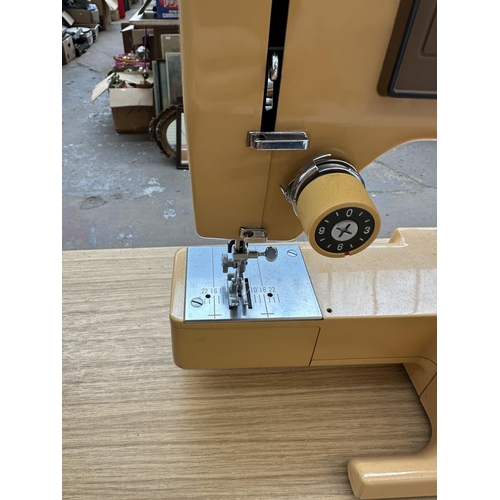 869 - A Frister + Rossmann 64 electric sewing machine