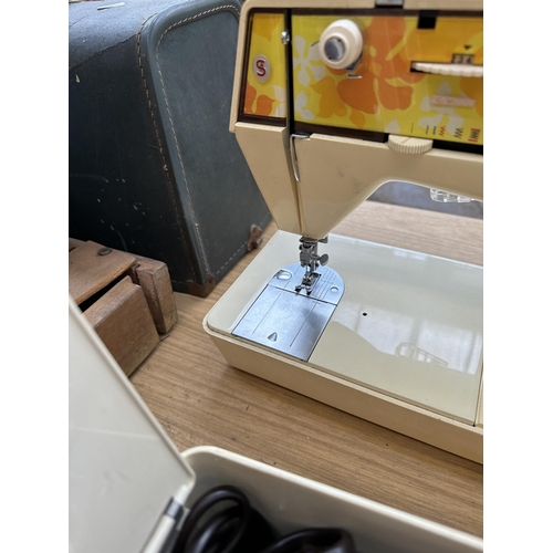 872 - A mid 1970s cased Singer Starlet 354 electric sewing machine with foot pedal and instruction manual