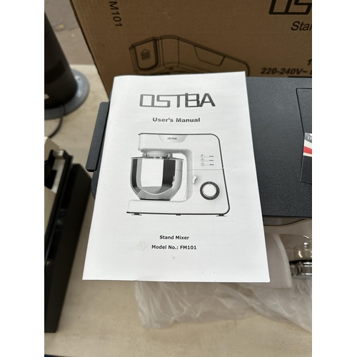 876 - A boxed Ostba FM101 stand mixer with instruction manual