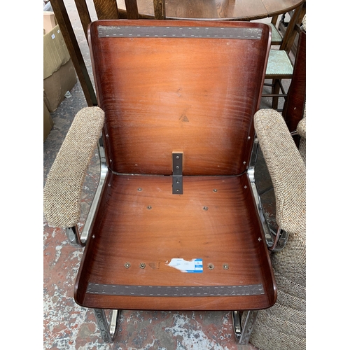 234 - Eight Gordon Russell Executive chrome and simulated rosewood desk chairs