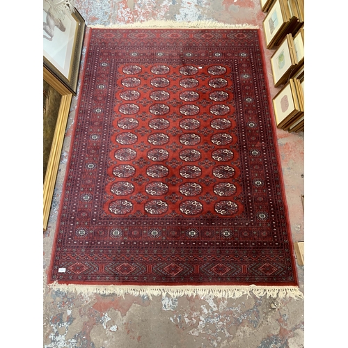 259 - A vintage Super Keshan 100% wool machine woven rug - approx. 208cm long x 141cm wide