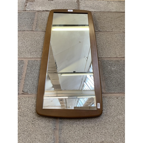 263 - A 1970s teak framed rectangular wall mirror - approx. 79cm high x 34cm wide