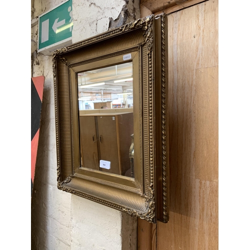 264 - A 19th century gilt framed rectangular wall mirror - approx. 48cm high x 39cm wide