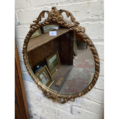 265 - A mid 20th century French style gilt framed circular wall mirror - approx. 59cm high x 48cm wide