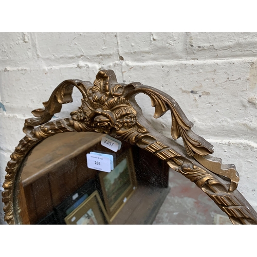 265 - A mid 20th century French style gilt framed circular wall mirror - approx. 59cm high x 48cm wide