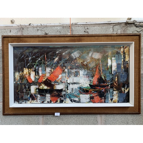 273 - A mid 20th century framed oil on canvas of a boat scene, signed lower left - approx. 60cm high x 110... 