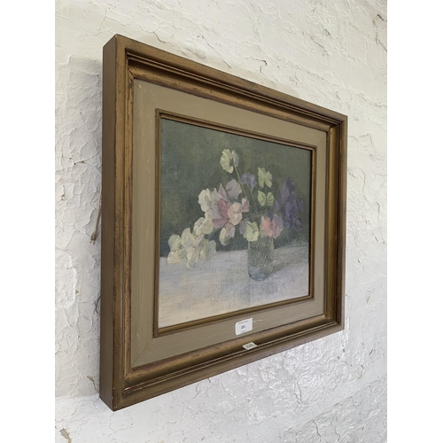 281 - A 20th century framed floral still life oil on canvas - approx. 44cm high x 49cm wide