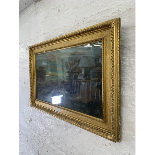 284 - An early 20th century gilt framed oil painting of a landscape scene, signed A. B. and dated 1924 - a... 