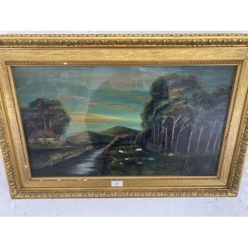 284 - An early 20th century gilt framed oil painting of a landscape scene, signed A. B. and dated 1924 - a... 