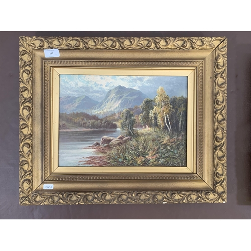 292 - Two early 20th century gilt framed landscape scene oil paintings on canvas, signed JS and dated 1916... 